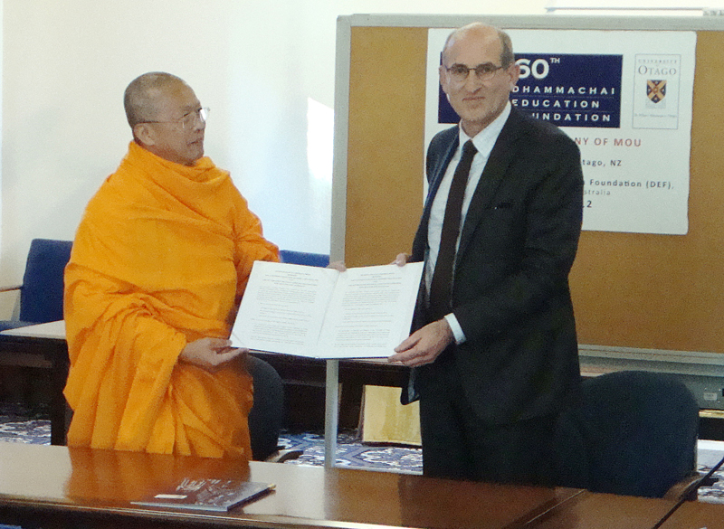 Ven. Sudhammo and Professor Moloughney with the MoU