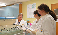 Dorothy Saville with students in the lab