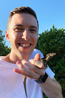 Lachie Scarsbrook holding a Duvaucel's gecko image