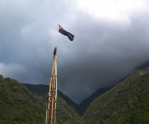 Orographic rainfall forms on the Southern Alps with the deep fault drilling project drill rig in the foreground