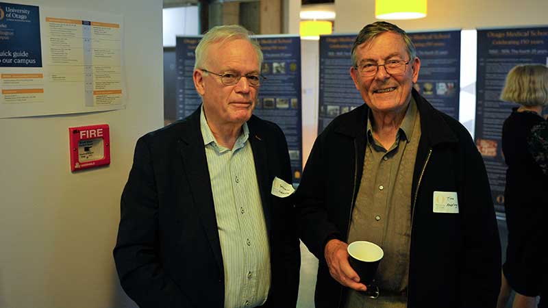 Two men standing 