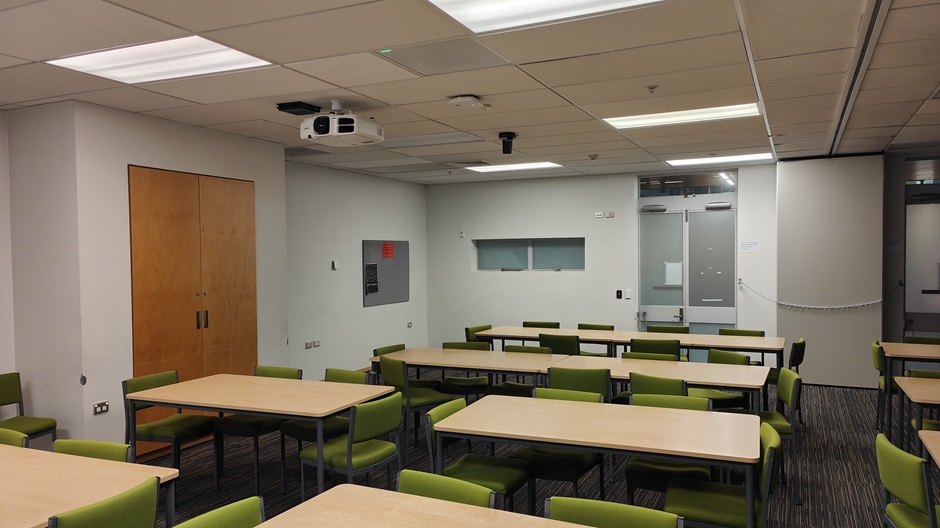 Setup of Hunter Centre rooms HUG30A-B showing movable tables and chairs and a movable dividing wall
