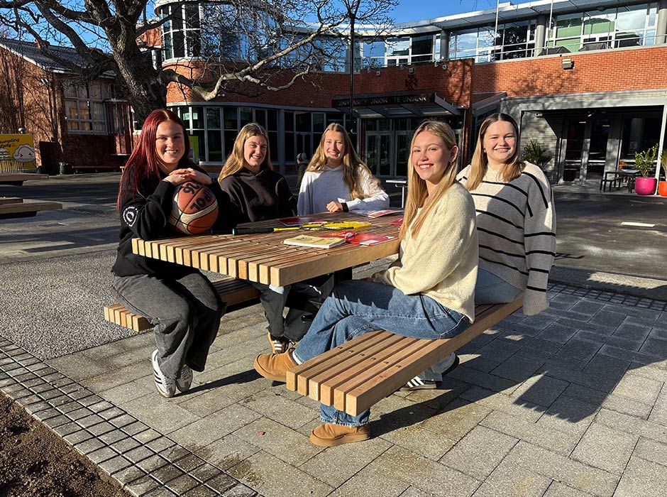 Making use of the new tables on the Union Lawn are, from left, third year tauira Emily Mabbitt and second years Brooklyn Rycroft, Tori Russ, Ursula Stenberg and Kaitlyn Murray.
