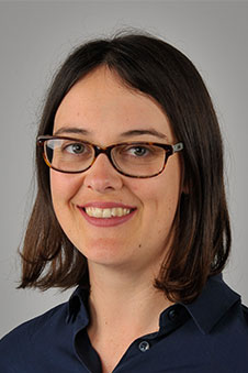 A headshot of Dr Elinor Chisholm