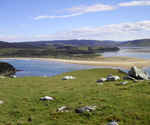 Standing on a resistant headland of Murihiku Terrane Jurassic conglomerate overlooking Waikawa Harbour, Catlins Coast. 