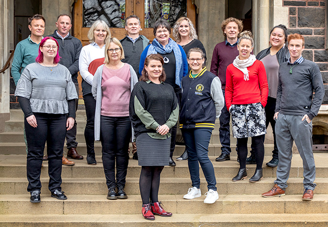 Communications-Team-Group-Photo-2020-Outside-the-Clocktower 650w image