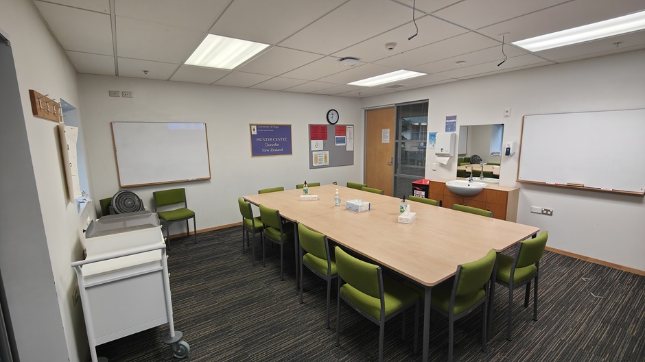 Setup of Hunter Centre rooms HU102-3-5-6-8-9-11 showing chairs around a table, and medical equipment