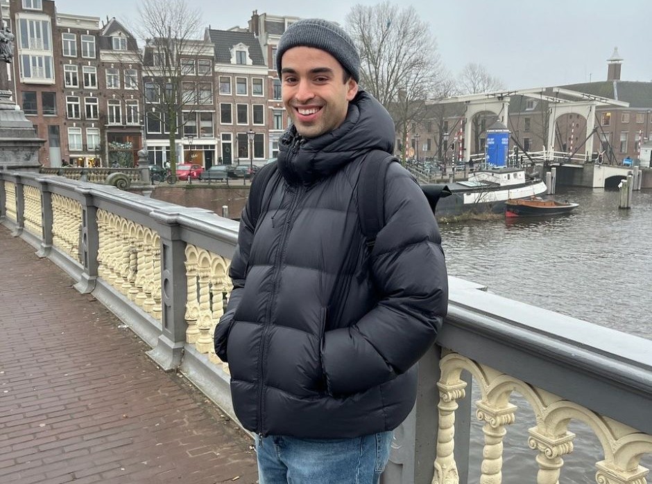 A man standing on a bridge 