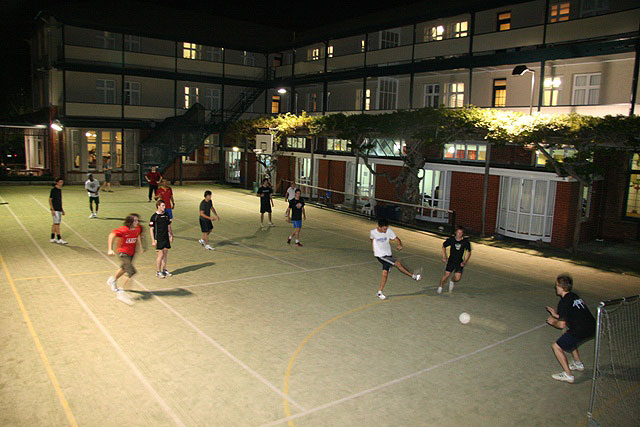 Social sport on the court at night