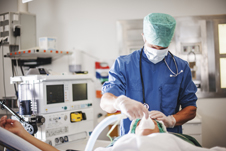 An anaesthetist at work in the theatre