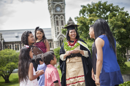Pacific graduate with family
