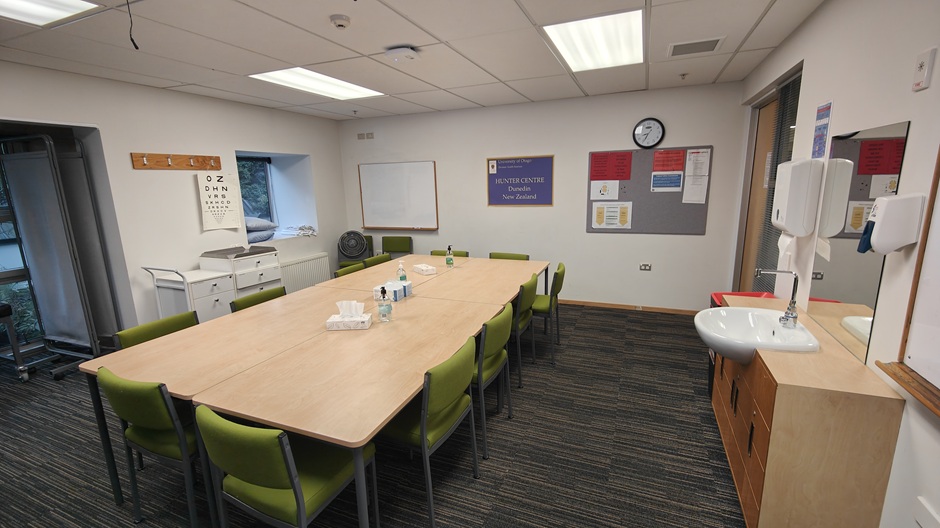 Setup of Hunter Centre rooms HU102-3-5-6-8-9-11 showing chairs around a table, and medical equipment