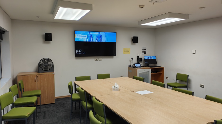 Setup of Hunter Centre rooms HUG102-3-5-6-8-9-11 showing chairs around a table