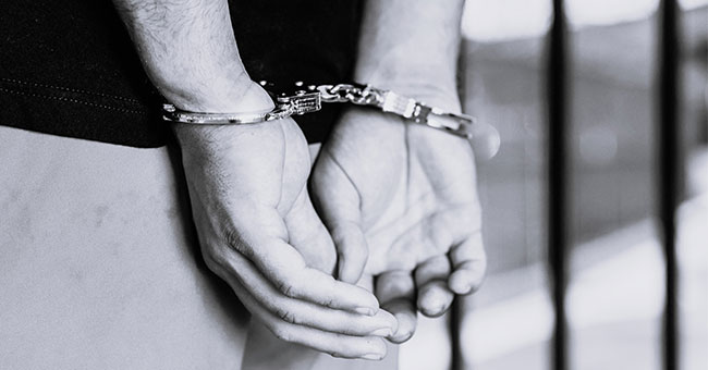 Man in handcuffs image