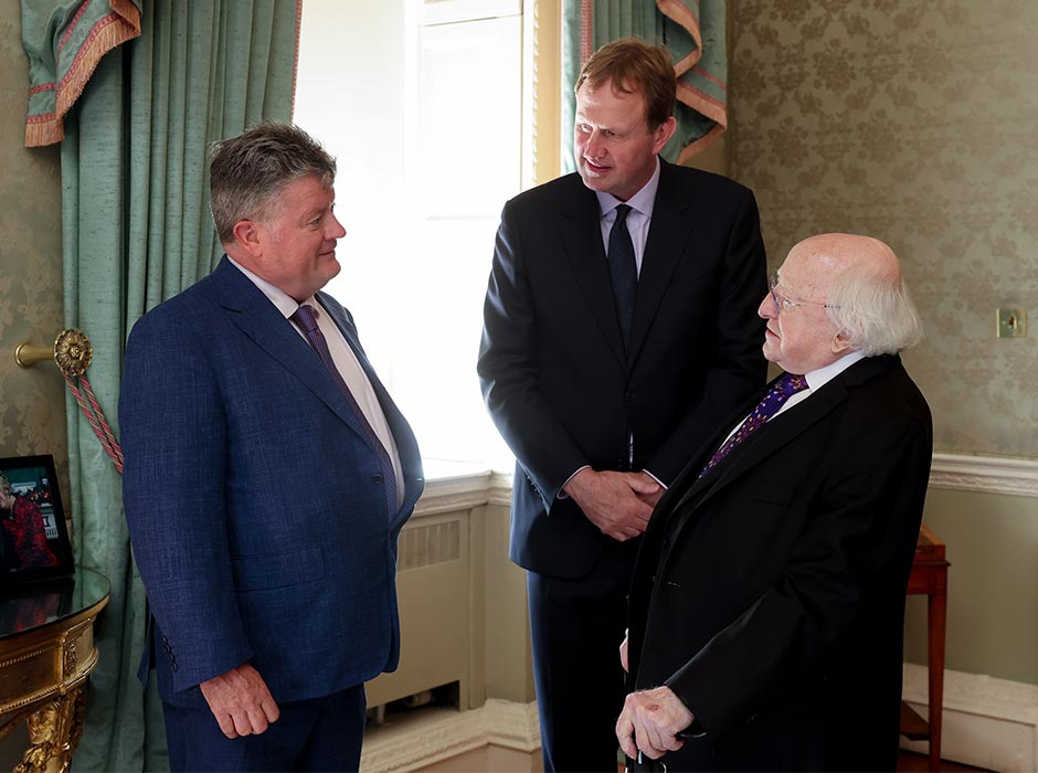 Liam Kennedy (left), with Irish Minister of Justice Jim O'Callaghan (centre) and former Irish President Michael D Higgins, at Liam's High Court appointment celebration at Áras an Uachtaráin (the official residence of the President of Ireland).