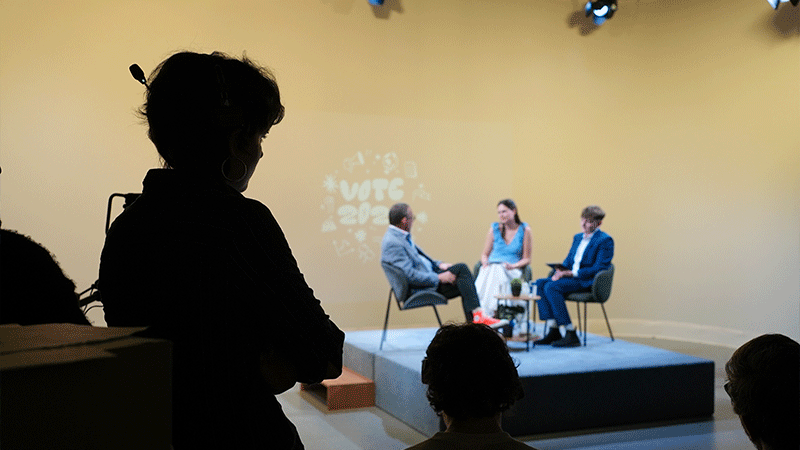 student watches interview