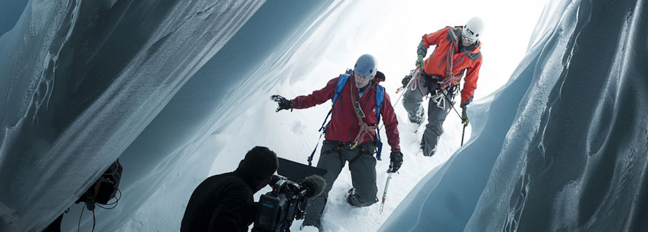 Gus Roxburgh filming in ice cave banner