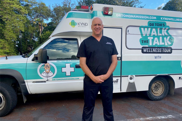 Dr Tom with his country touring chevvy ambulance main