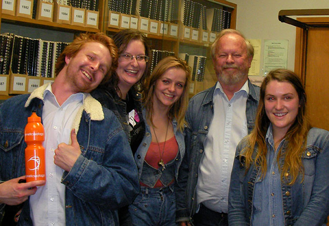 students wearing double denim with Russell Poulter