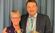 Jane Marriner and Professor Gary Hooper proudly displaying their CMSA awards thumb