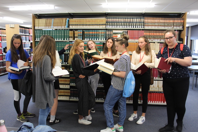 10 students reading law in the library