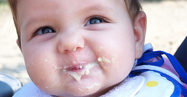 Baby with food on face