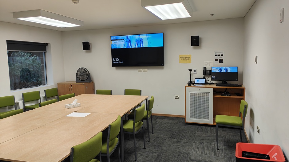 Setup of Hunter Centre rooms HUG102-3-5-6-8-9-11 showing chairs around a table