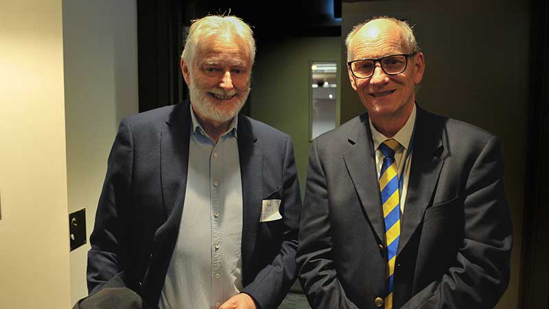 Two men standing