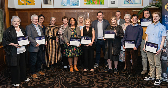 Disability Information and Support’s Appreciation Awards recipients were celebrated by their Otago hoamahi at a special event on Friday at the Staff Club. Pictured from left: Janice Snowden, Bill Gilmore, Lara Valentine, Claire Gallop, Melissa Lethaby, Inge Walgern, Margaret Grundy, Pauline Ellwood, Grant Robertson, Natalie Smith, Jeff Ormandy, Wendy Middlemiss, Caleb Lopez-Sanchez, Yitian Li, Daniel Lyth. Absent: Barbara Stone, Ollie Simcock-Smith, Isabelle Kennedy.