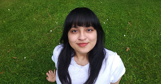 Nidhi-Bhagi-sitting on grass