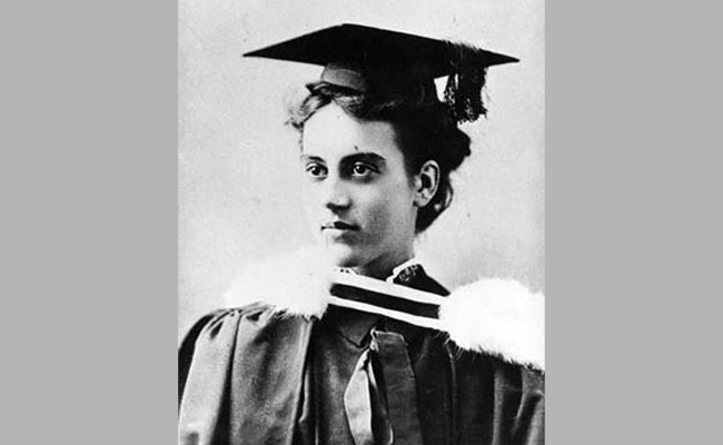 Old image of a female in graduate regalia 