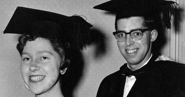 A woman and a man in graduation attire