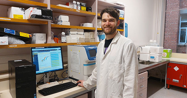 Matt-Reily-Bell at laboratory station