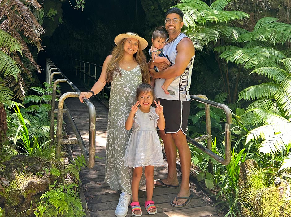 Visiting family in Hawaii recently are Josiah, right, with his wife Carrie and children Kalena (4) and Liliana-Grace (11 months).