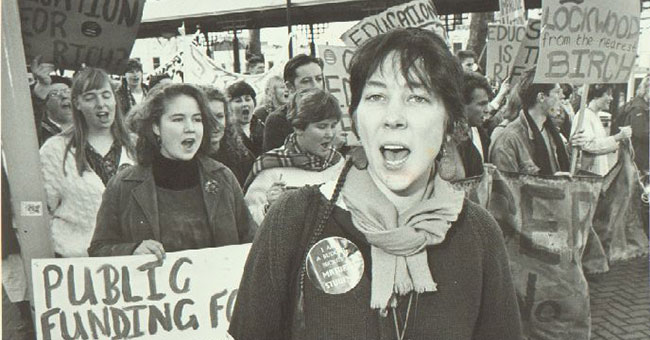 A woman leads a protest march in the Octagon in 1991.