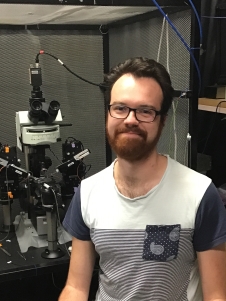 Bradley Jamieson in front of microscope 2019