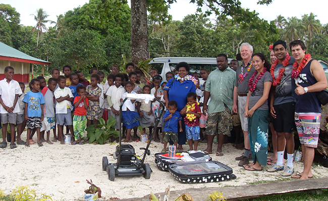 John Dawson and students in Vanuatu village school - image