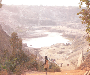 Artisanal miners re-working an abandoned open pit Cu/Co mine in the Democratic Republic of Congo