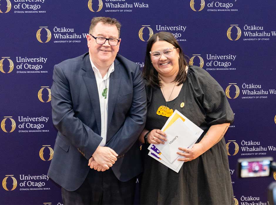 A man and a woman standing next to each other 