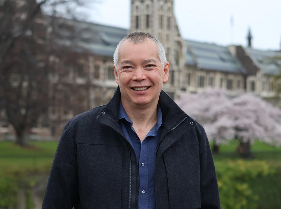 A man is pictured with the Clocktower in the background.
