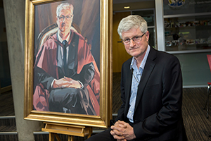 Professor Crampton at the portrait unveiling.