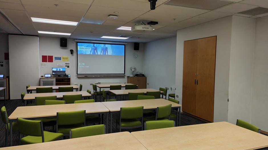 Setup of Hunter Centre rooms HUG30A-B showing movable tables and chairs and a movable dividing wall