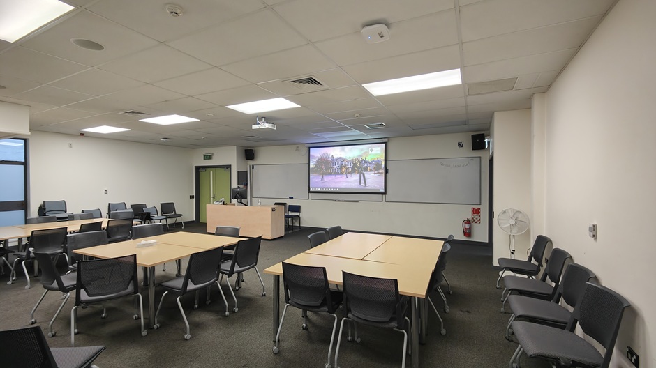 View of 71 Frederick St room 71FRG05 showing tables and chairs in groups