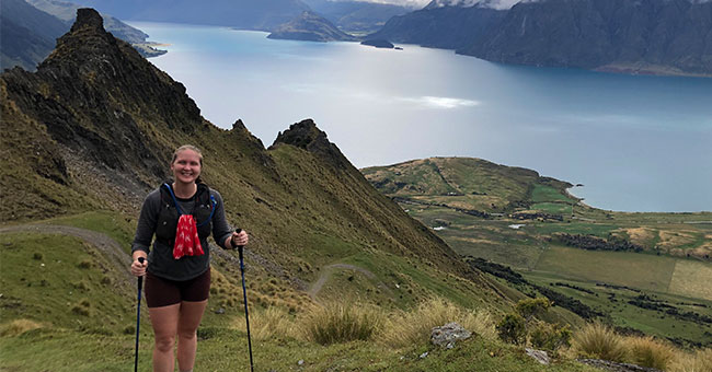 A woman is pictured in nature.