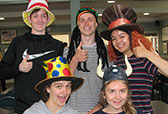 Group of people wearing fun hats-thumbnail image