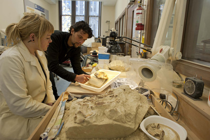 Sophie White and Gabrielle Aguirre Fernandez work in the paleo prep lab.