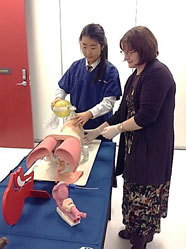 MaryLeigh Moore and a student from Rangi Ruru Girls High School GATE programme learning Airway techniques on a part-task trainer at the Simulation Centre