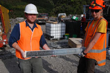 Virginia Toy (Otago University) and Brett Carpenter (PennState University) with the drillcore that contains the Alpine Fault. Brett's left hand marks the position of the fault