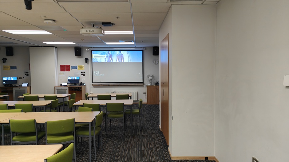 Setup of Hunter Centre rooms HUG30A-B showing movable tables and chairs and a movable dividing wall