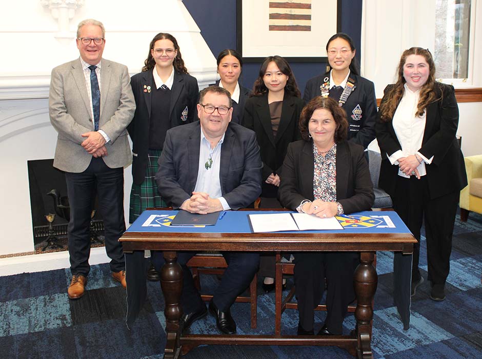 University of Otago Vice Chancellor Hon Grant Roberston and Otago Girls’ High School Principal Bridget Davidson (front) at the MOU signing. Also pictured (standing, left to right) are University of Otago Pathway Director Garry Chronican, international students Martena Siefke, Mai Sameya, Pamela Peng (former Otago Girls’ international student now studying at Otago), Allison Han, and Otago Girls’ High School Director of International Students Rose Gilani.   